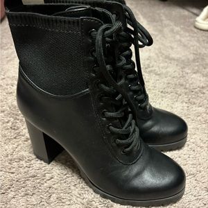 Black lace up boots.